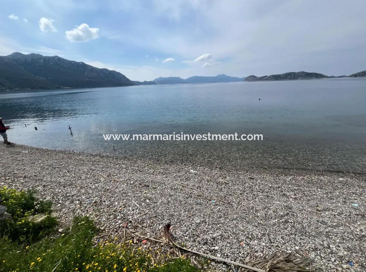 Detached House For Sale On 2000M2 Plot Of Land By The Sea In Marmaris Söğüt Neighborhood. Suitable For Tying A Boat In Front Of It.