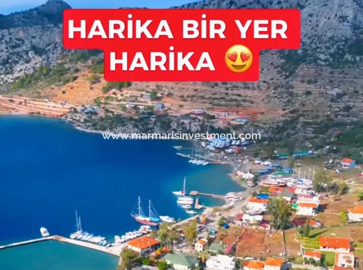 Marmaris Söğüt Köyünde Denize Sıfır 1000M2 Arsa İçerisinde 6 Odalı  Havuzlu Yalı Dairemiz Satılık.önüne Tekne Bağlayabilirsiniz.